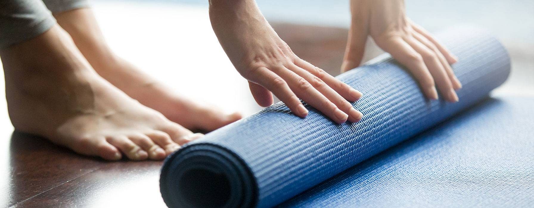 yoga mat is rolled out