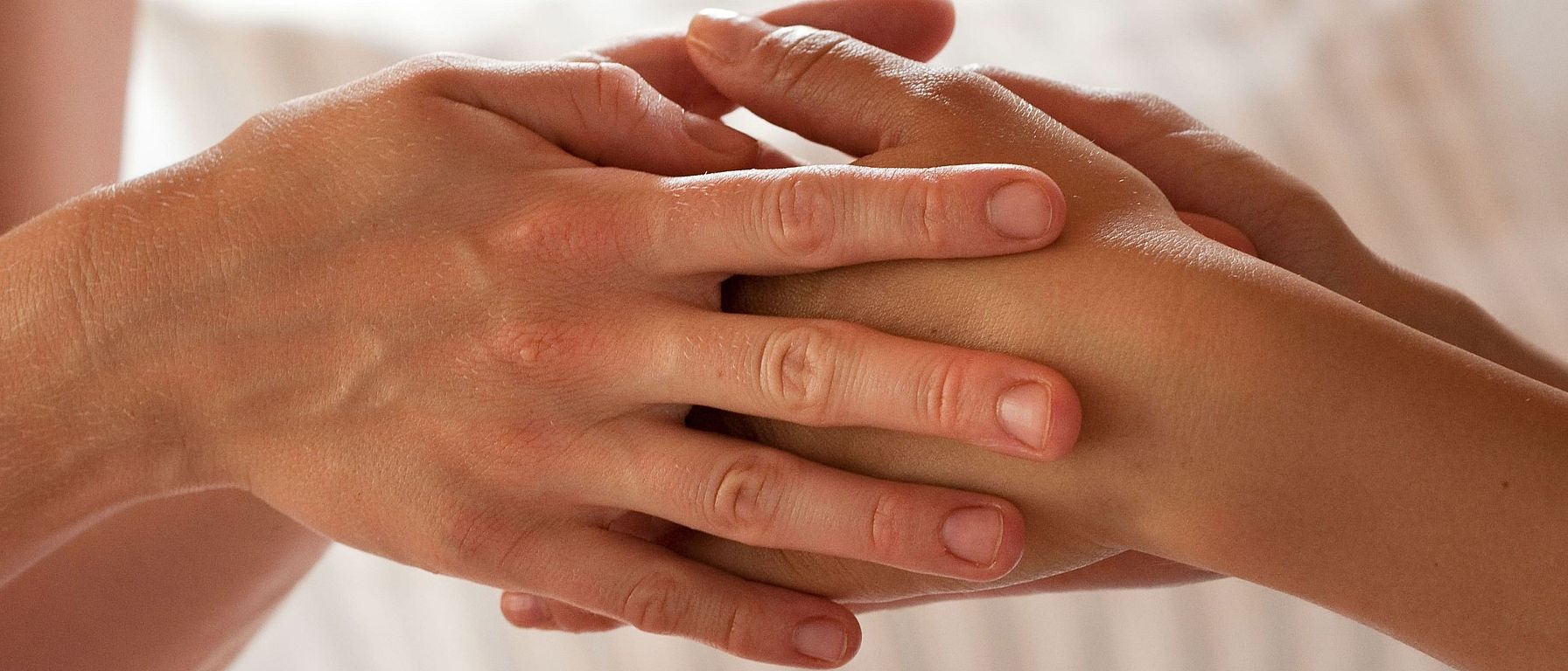 Two touching hands