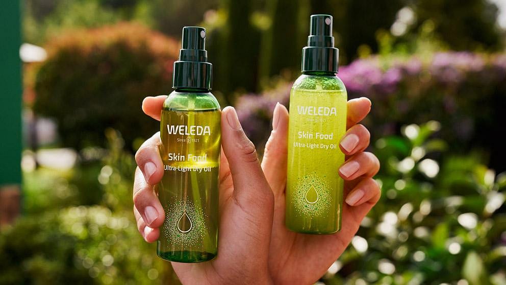 two hands with spray