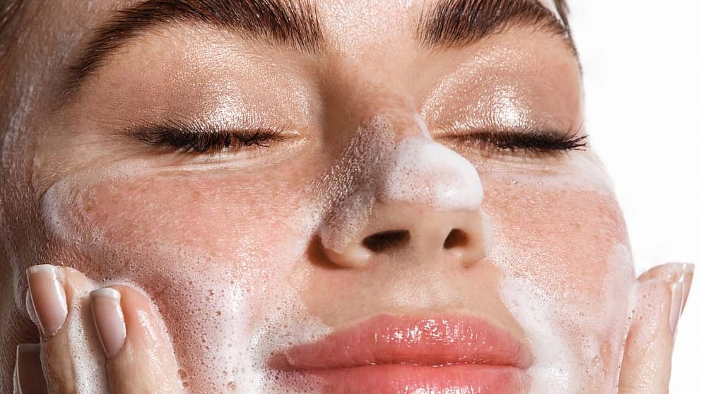 cleansing woman closed eyes